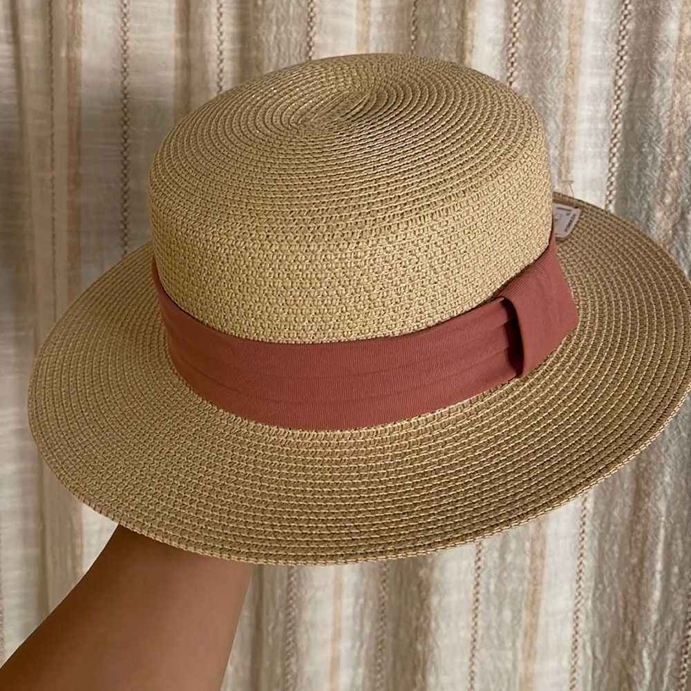 Wide brimmed hat with pink band